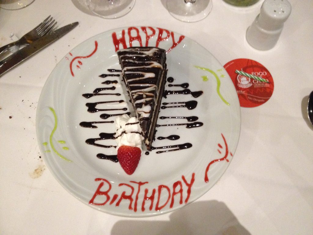 A cake on a decorated plate.