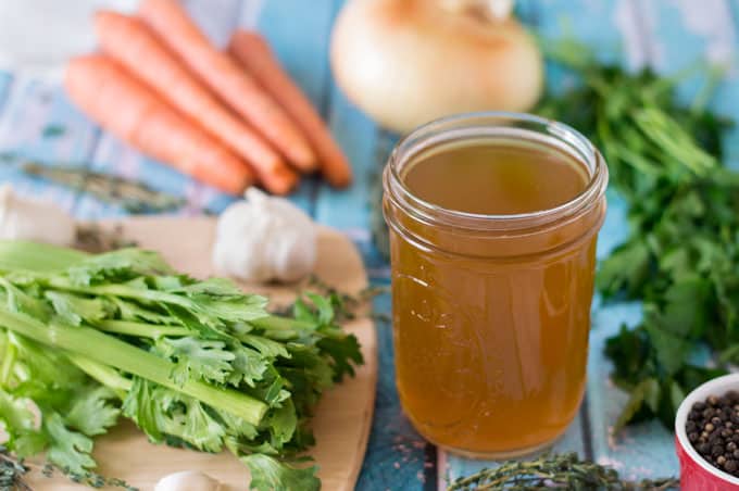 Chicken stock in a mason jar.