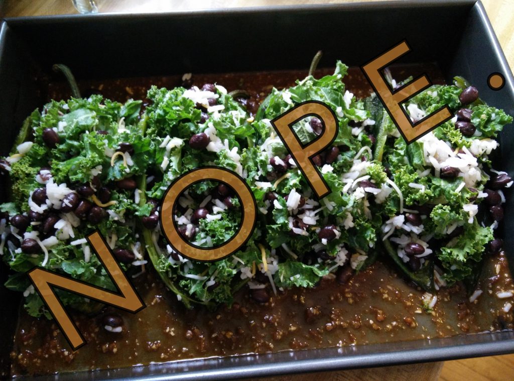 Title image of kale-stuffed peppers in a baking dish with overlay text.