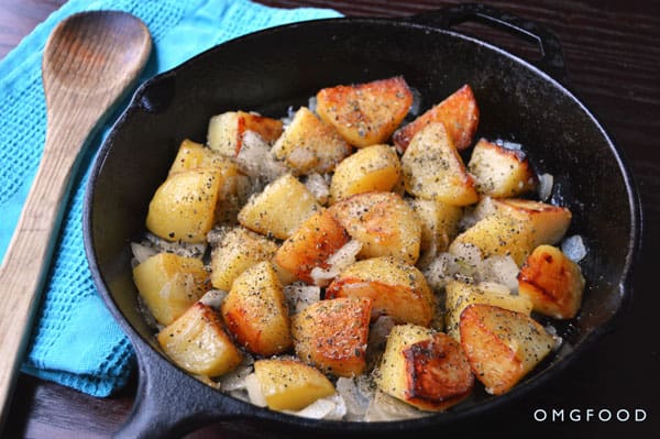 Home fries in a skillet.