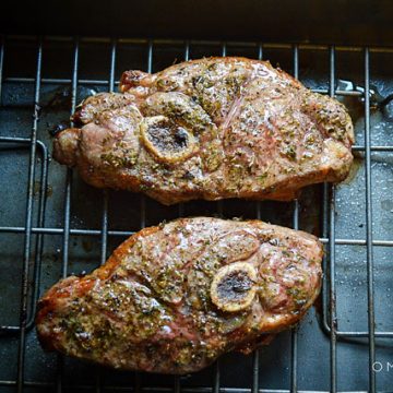 Lamb shoulder chops in a baking dish.