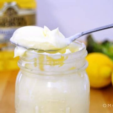 Closeup of homemade mayonnaise in a jar.
