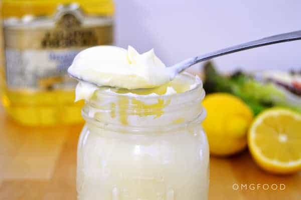 Closeup of homemade mayonnaise in a jar.