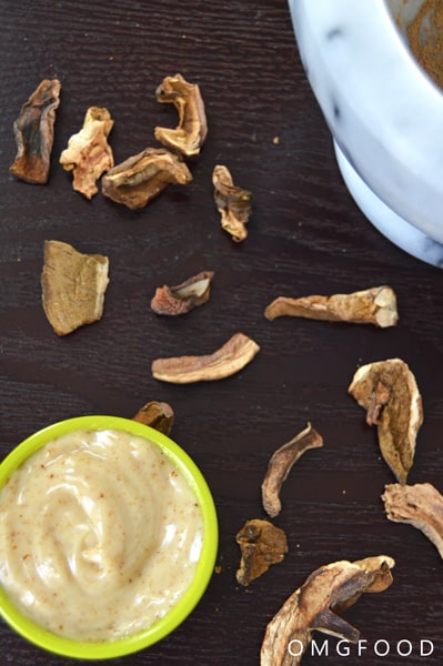 Umami mayo in a small bowl with dried mushrooms.