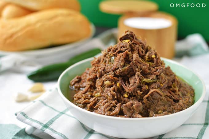 A closeup of shredded beef in a bowl.