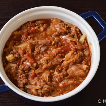 Closeup of unstuffed cabbage in a small dutch oven.