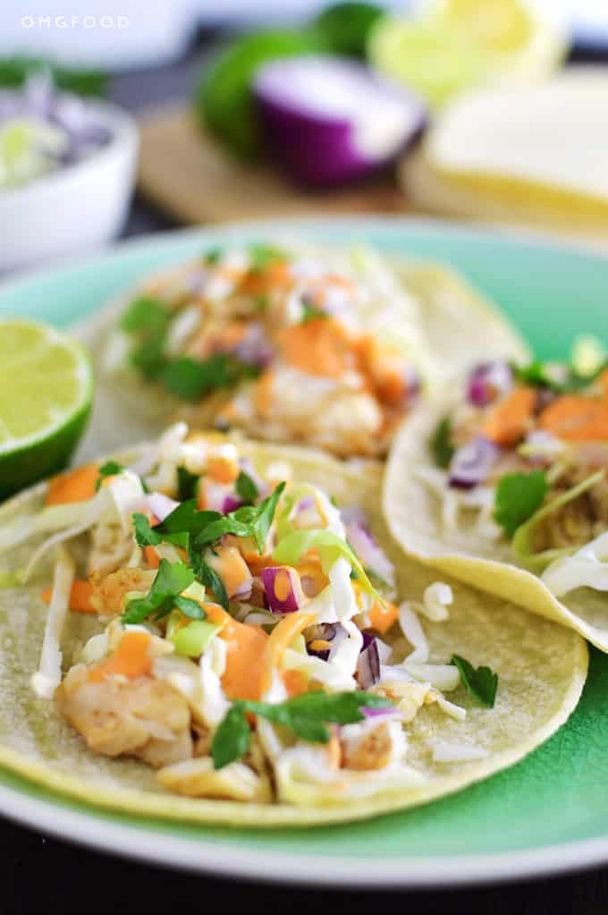 Closeup of fish tacos on a plate.