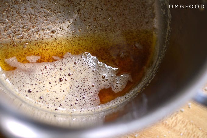 Closeup of browned butter in a saucepan.