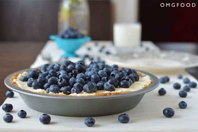 Closeup of blueberry pie on a tabletop.