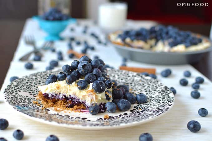 A slice of blueberry cream pie on a plate.