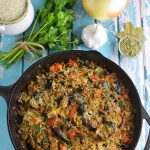 One Pot Greek Eggplant and Rice - An easy to make baked casserole topped with mizithra cheese! | omgfood.com