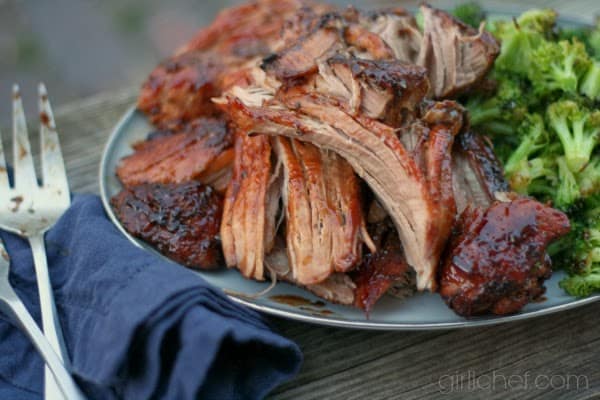 Close up of shredded pork on a plate.