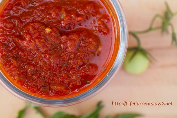 A closeup of marinara sauce in a bowl.