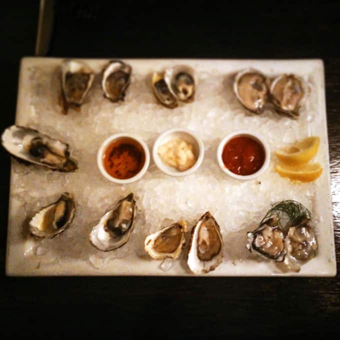 A platter of raw oysters.