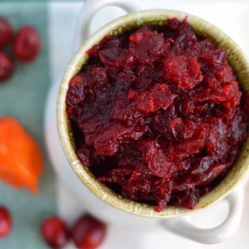 A closeup of cranberry jelly in a bowl.
