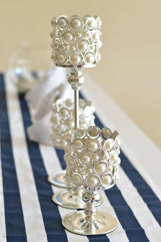 A closeup of vases on a tabletop.