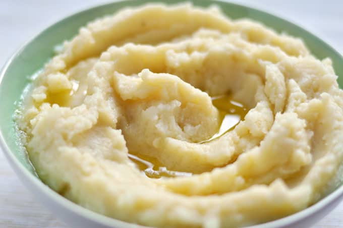 A closeup of potato dip in a bowl.