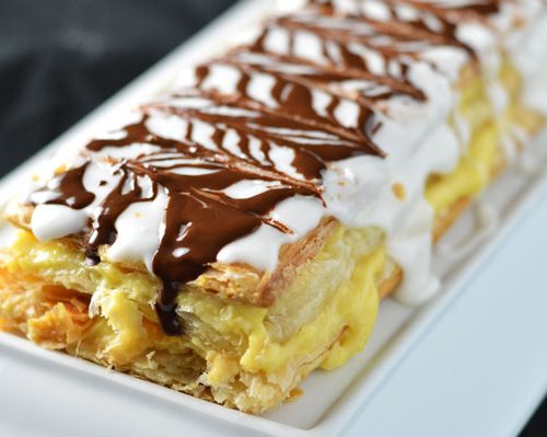Closeup of mille feuille on a platter.