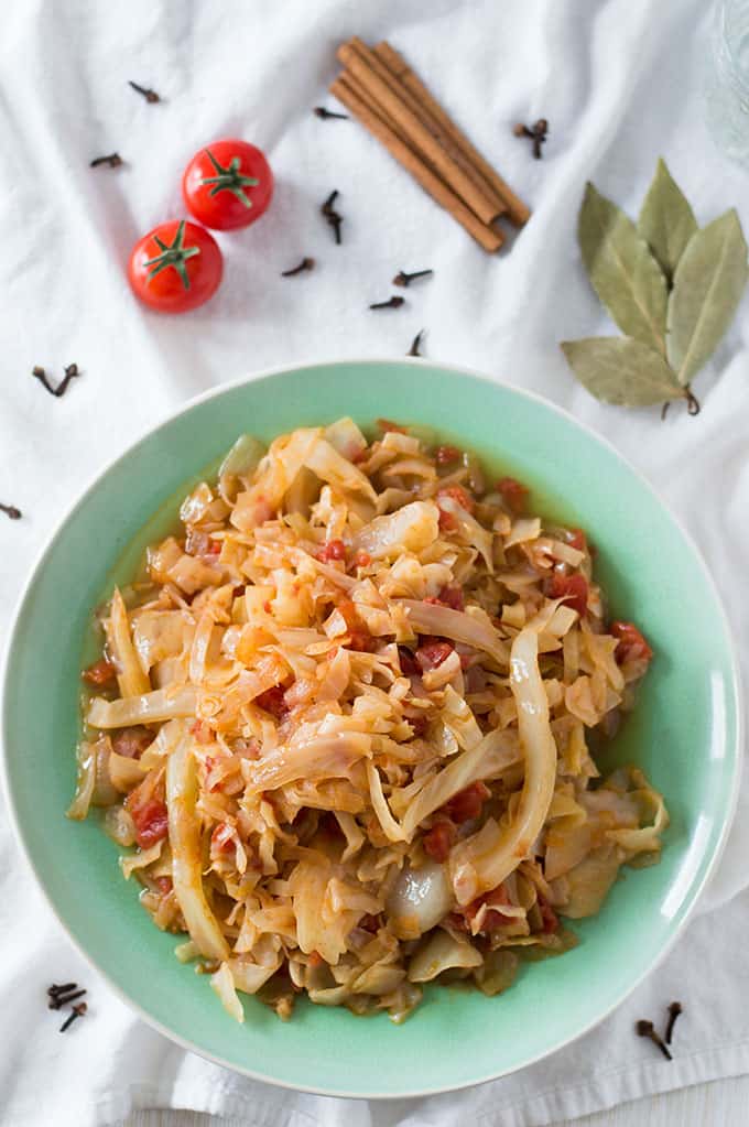 A plate of cooked shredded cabbage.