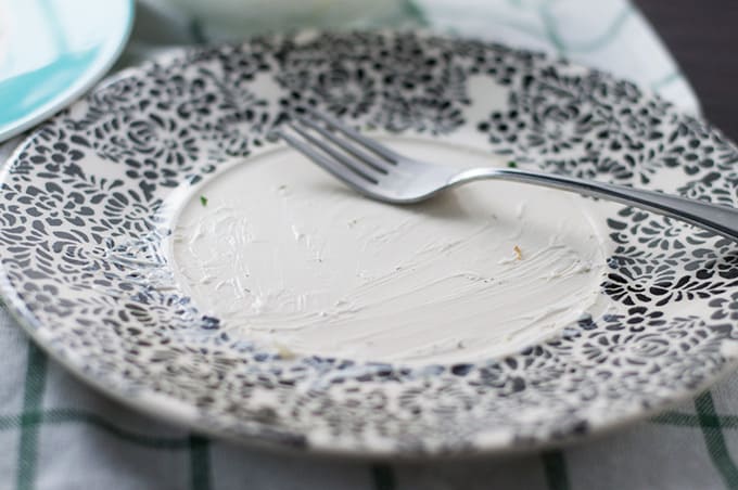 An empty plate with a fork.