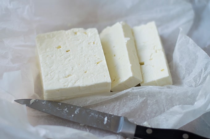 Closeup of sliced feta cheese.