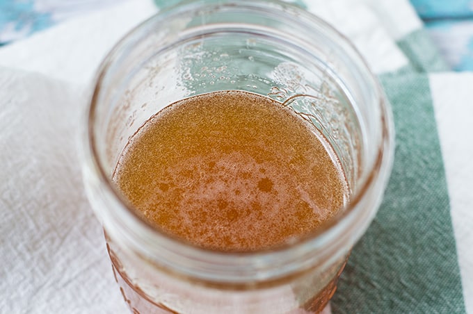 Close up of a jar of decrystallized honey.