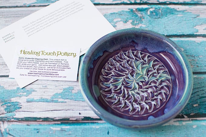 A close up of a grating and dipping dish.