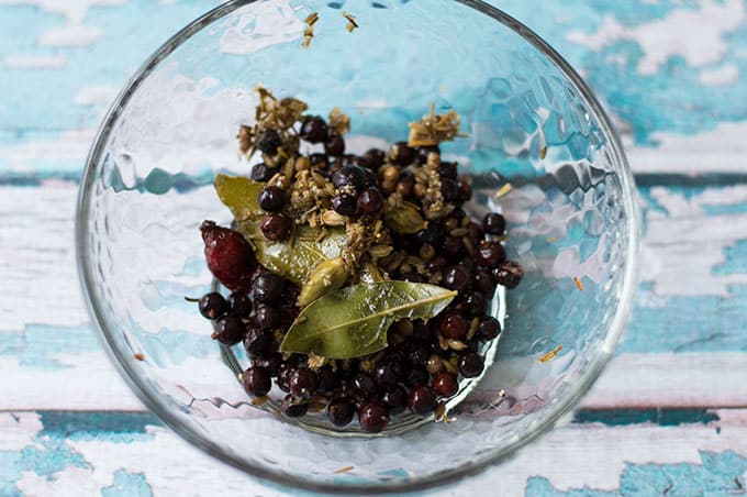 A glass bowl of strained spices.