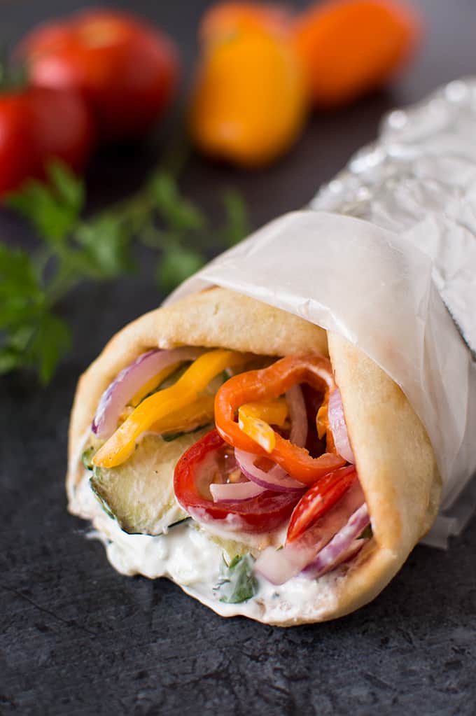 Closeup of a zucchini and tinkerbell pepper wrap.