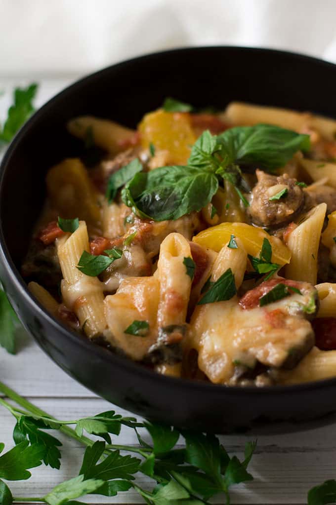 Close up of sausage and pasta in a bowl.