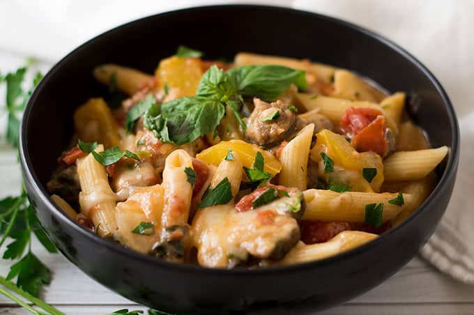 Close up of sausage and pasta in a bowl.