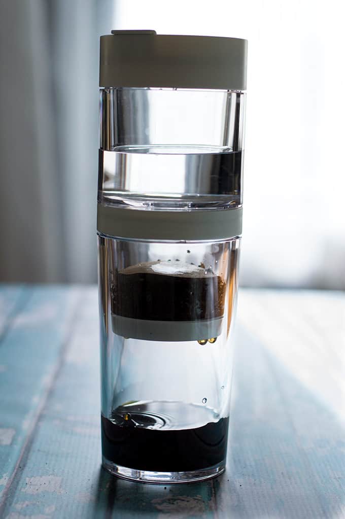 Coffee steeping in a cold brew coffee maker.