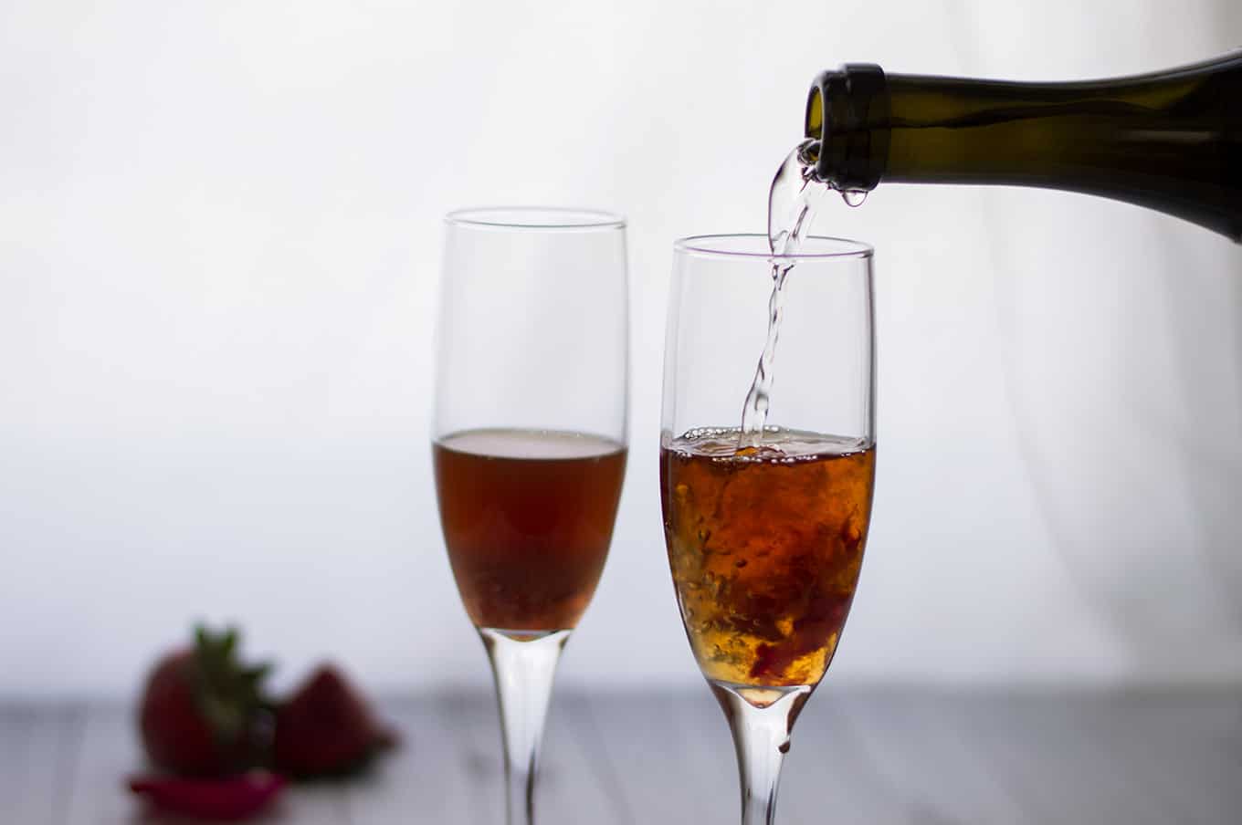 Champagne being poured into a glass.