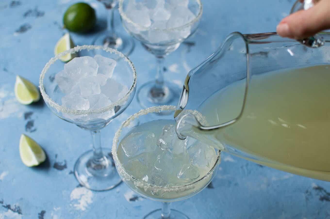 Margarita being poured into a glass.