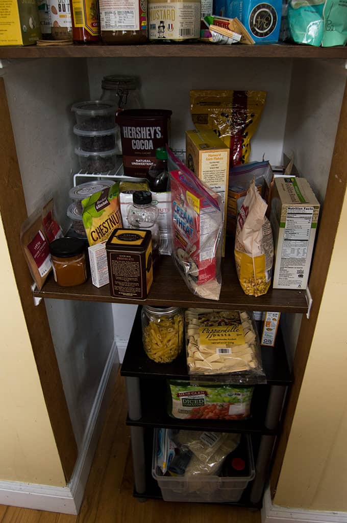 A group of pantry items on multiple shelves.