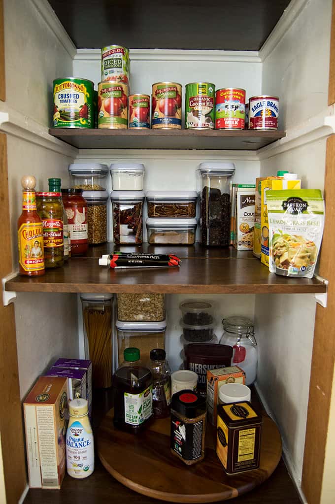 An organized kitchen pantry closet.