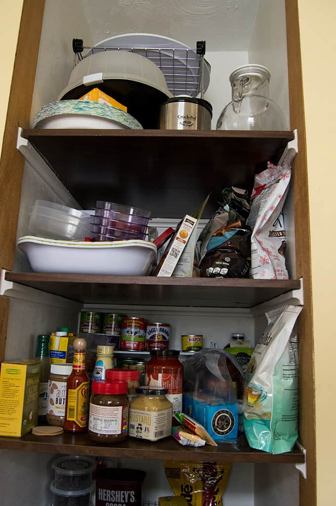 A group of pantry items on multiple shelves.