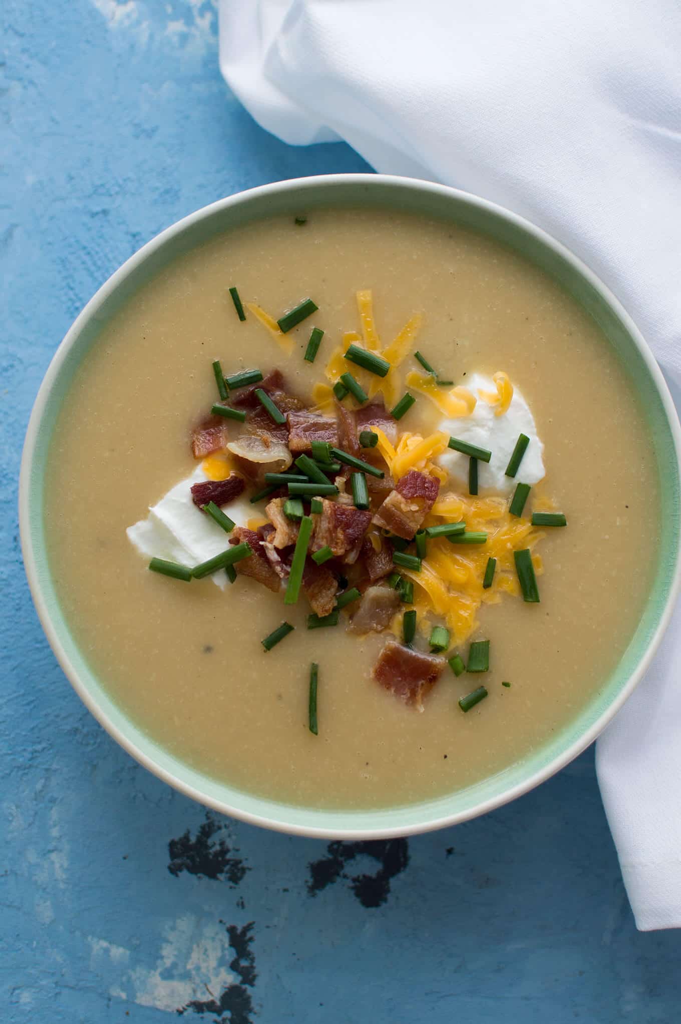 A bowl of cauliflower and potato soup.