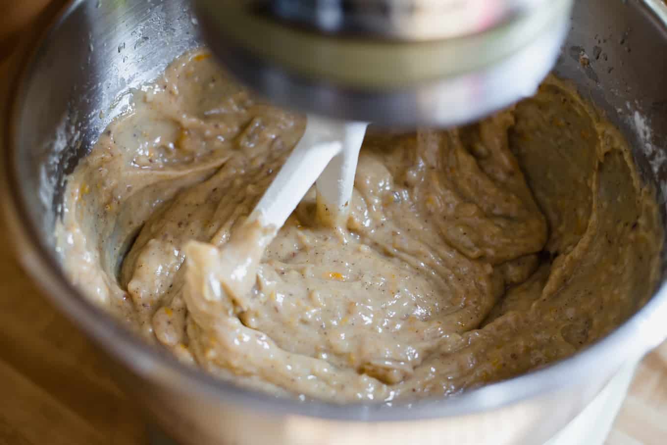 A close up of a fanouropita batter in a stand mixer.