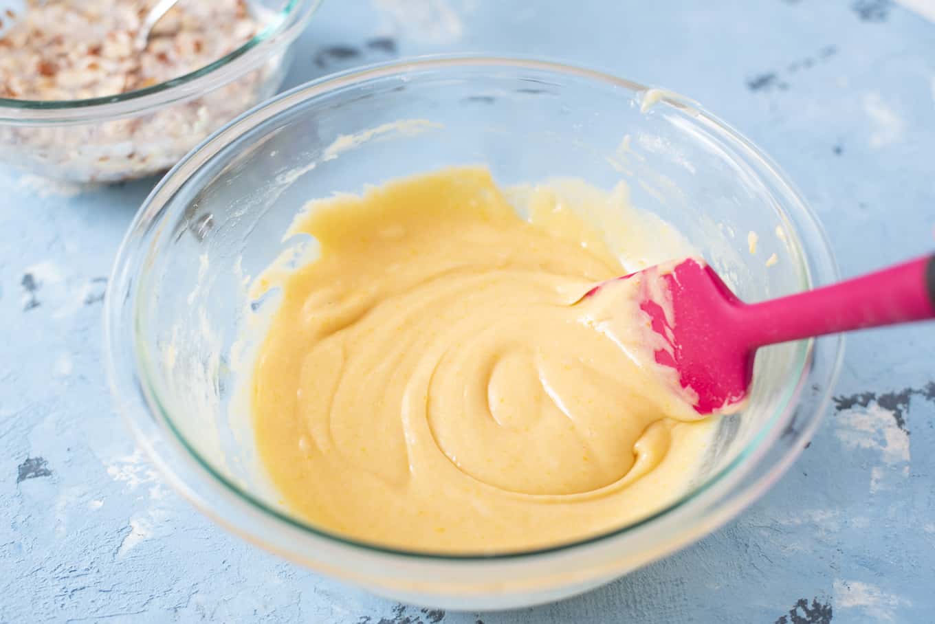 A glass bowl of Swedish visiting cake bar batter.